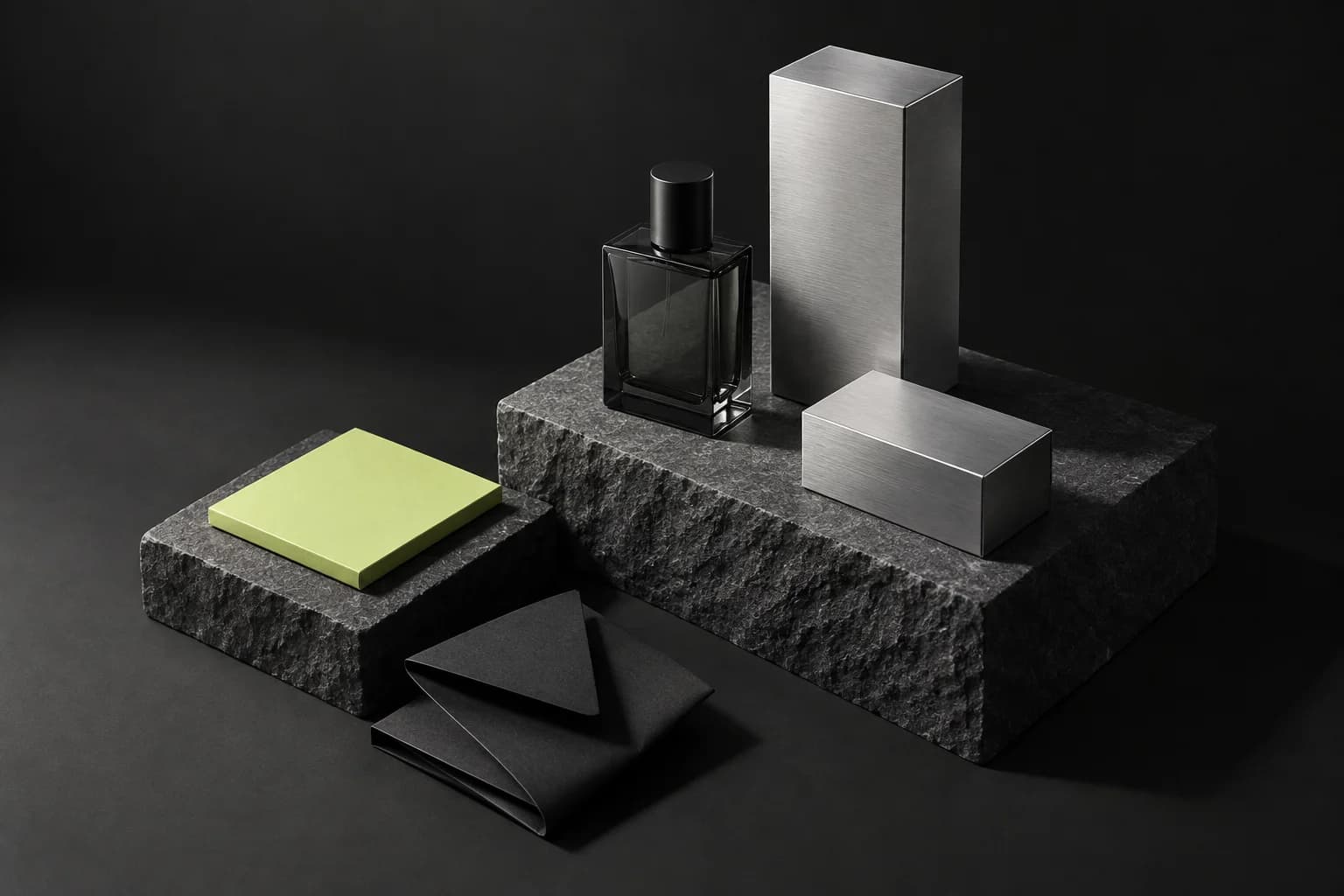 Conceptual precision-crafted silver packaging and smoked glass objects
